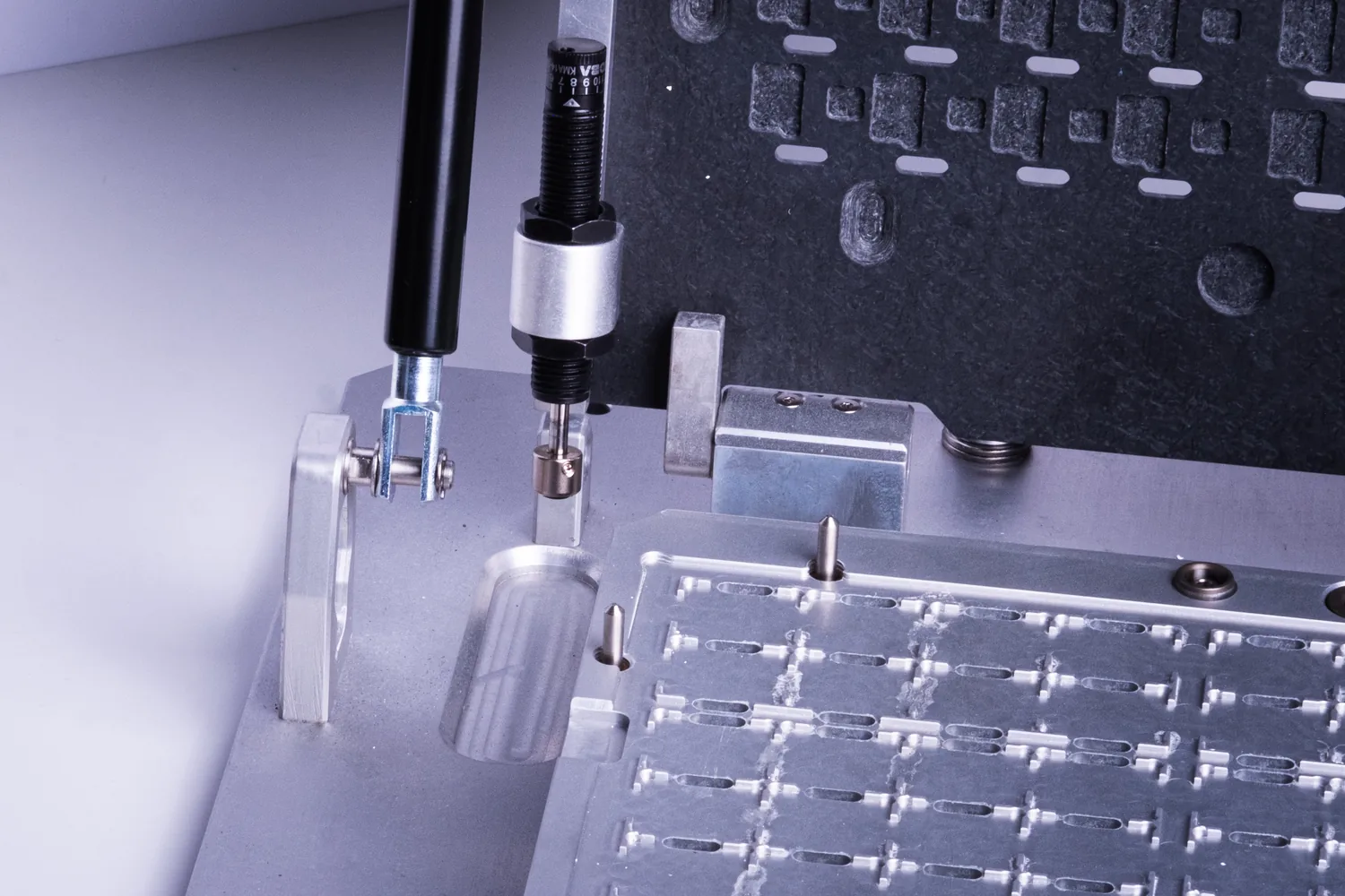 Depaneling fixture on an aluminium base plate with pneumatic clamping